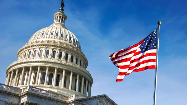 The Capitol Building in Washington DC, with flag flying
