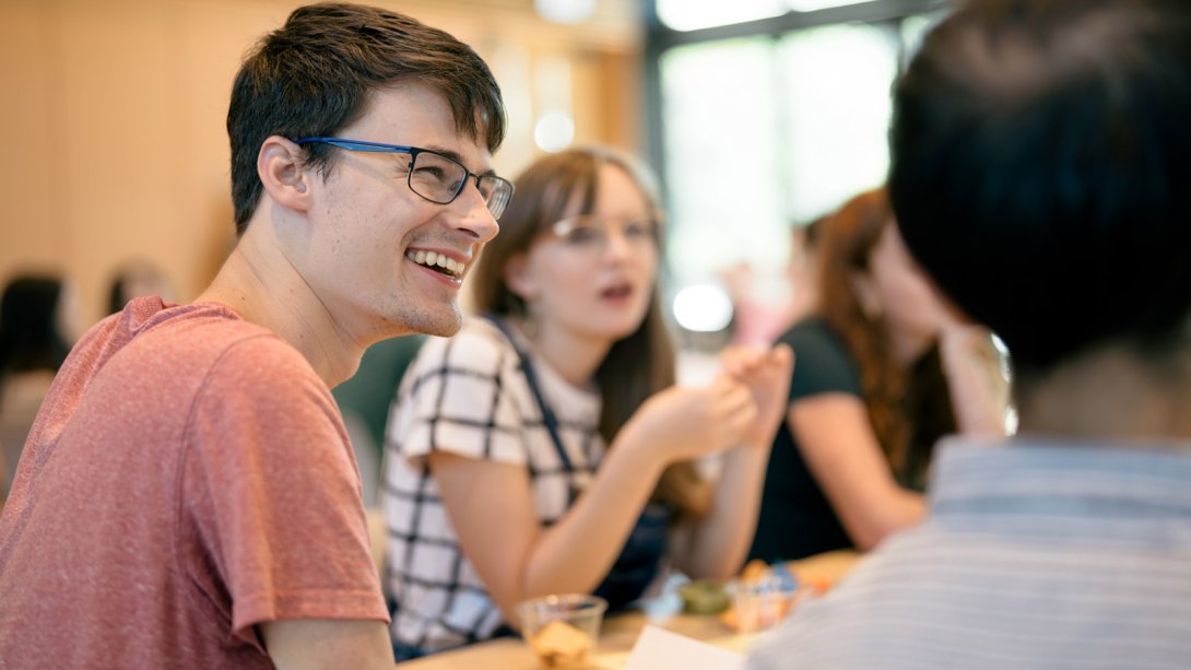 Student smiling as participating in the Civic Cornerstone Fellowship